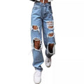 Thin jeans with wide legs and holes for women