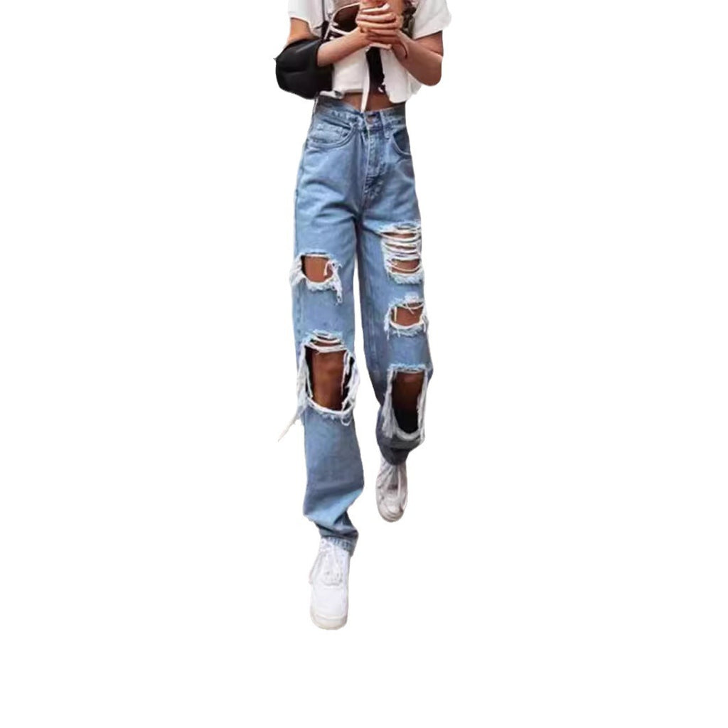Thin jeans with wide legs and holes for women