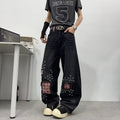 Vintage distressed patch embroidered jeans