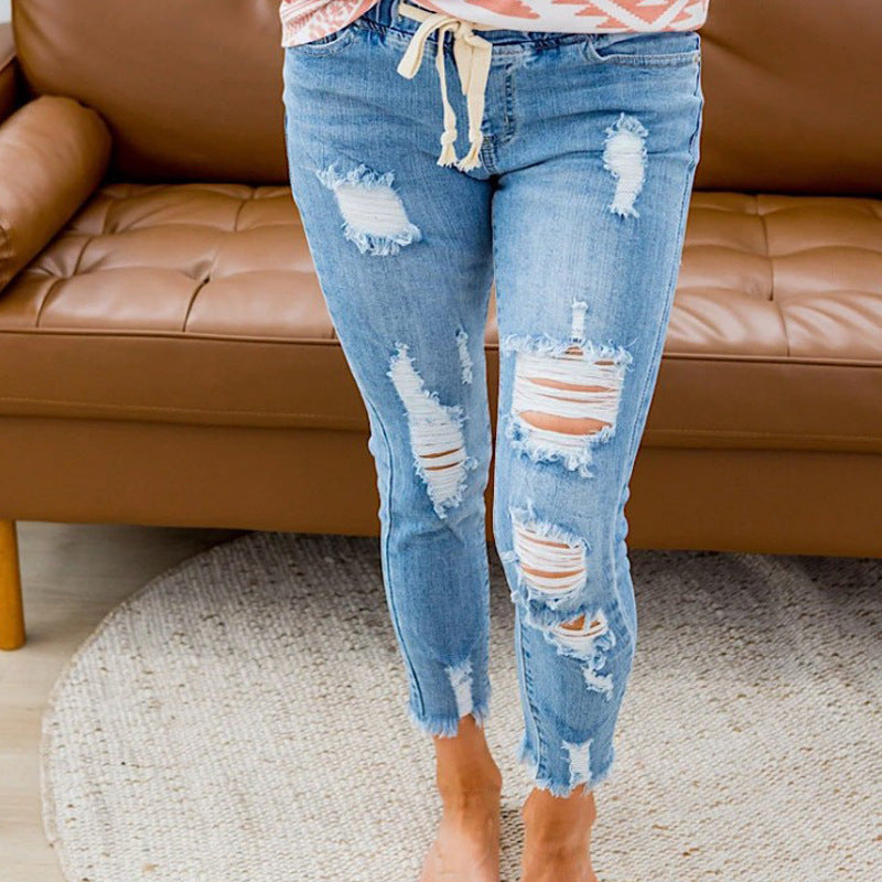 Elastic waist ripped hole small leg jeans for women