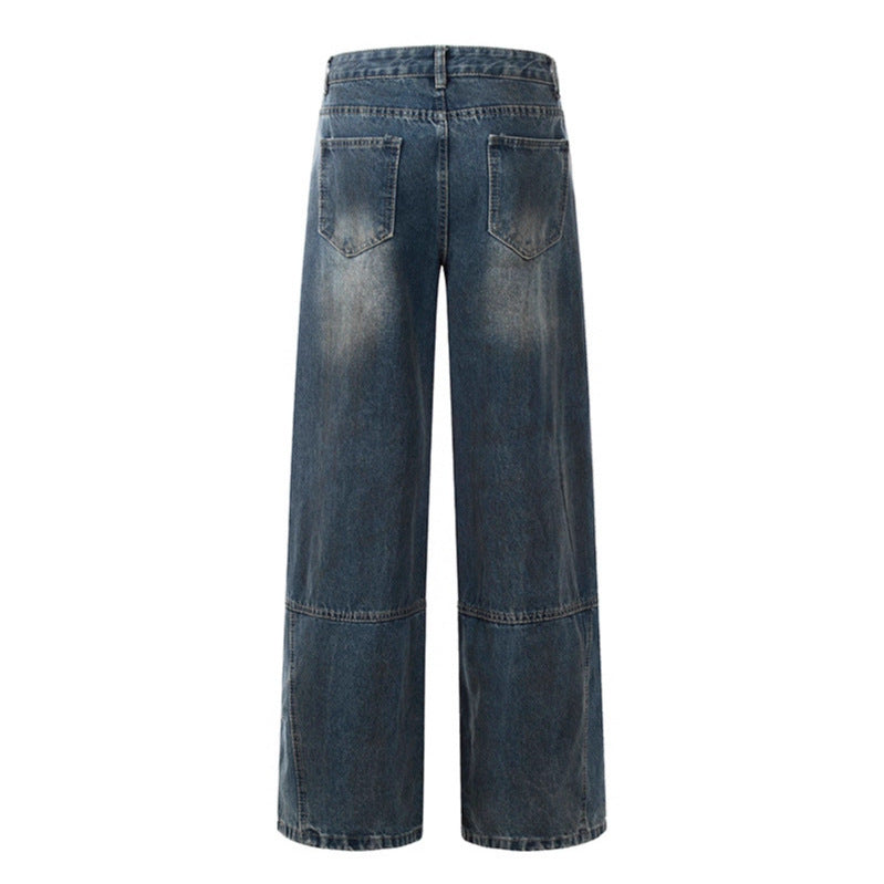 Old dirty dyed and ripped jeans