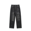 Ink splattered distressed men's jeans with holes
