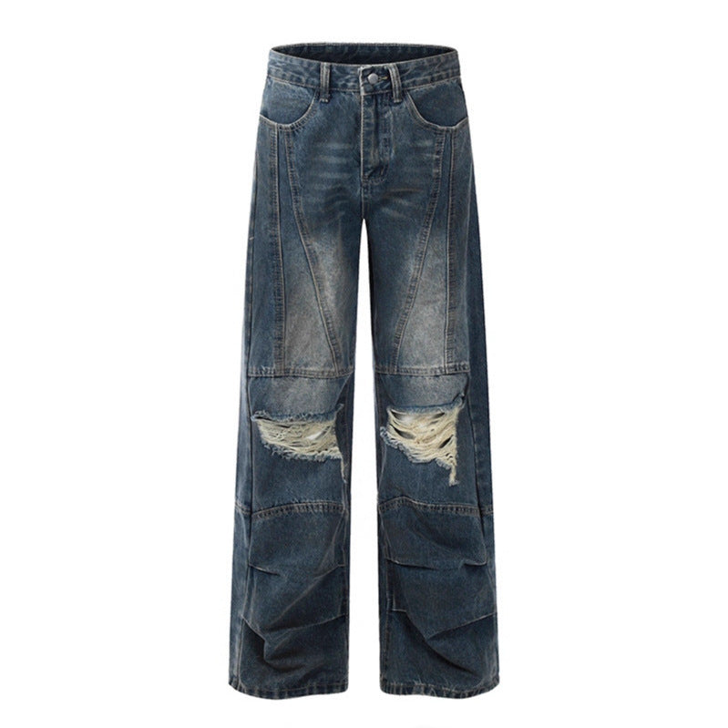 Old dirty dyed and ripped jeans