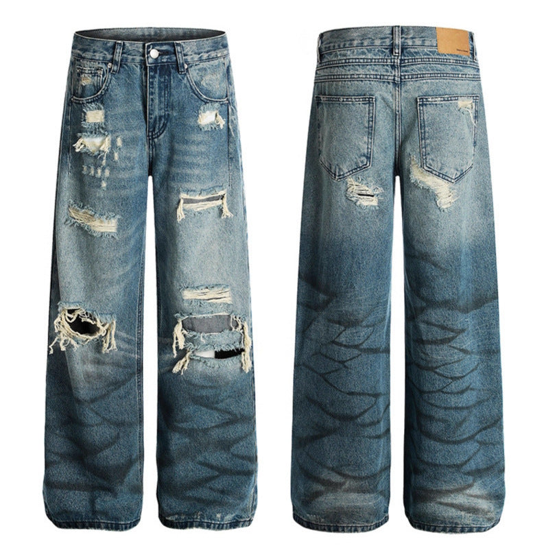 Washed blue ripped jeans for women