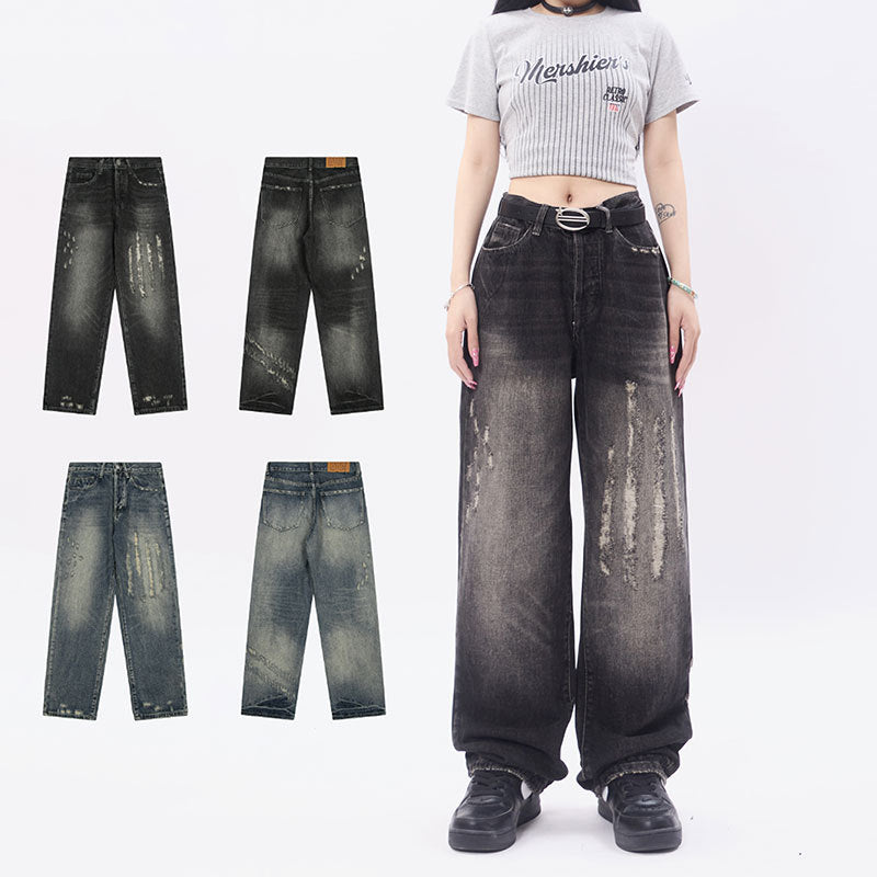 Loose distressed scratched straight leg jeans