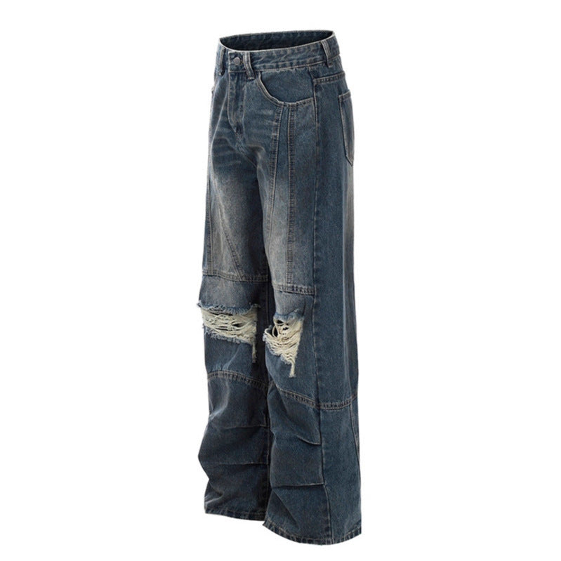 Old dirty dyed and ripped jeans