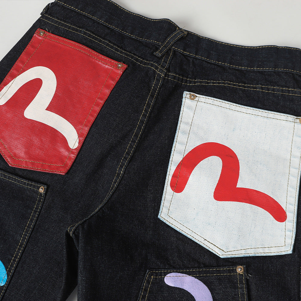 Irregular jeans with multiple pockets