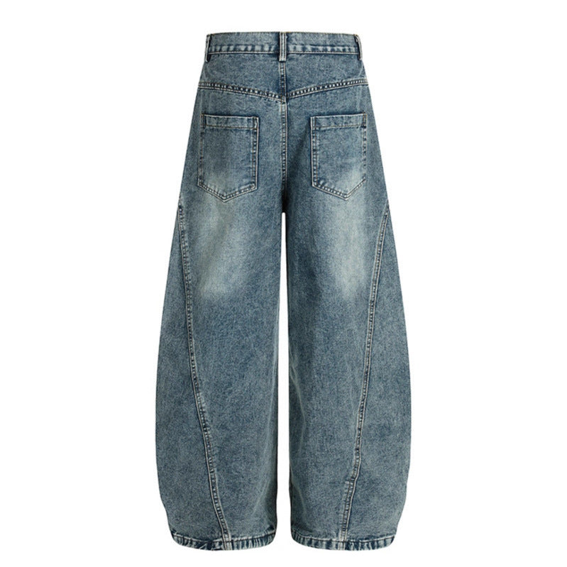 Embroidered wide leg curved knife jeans