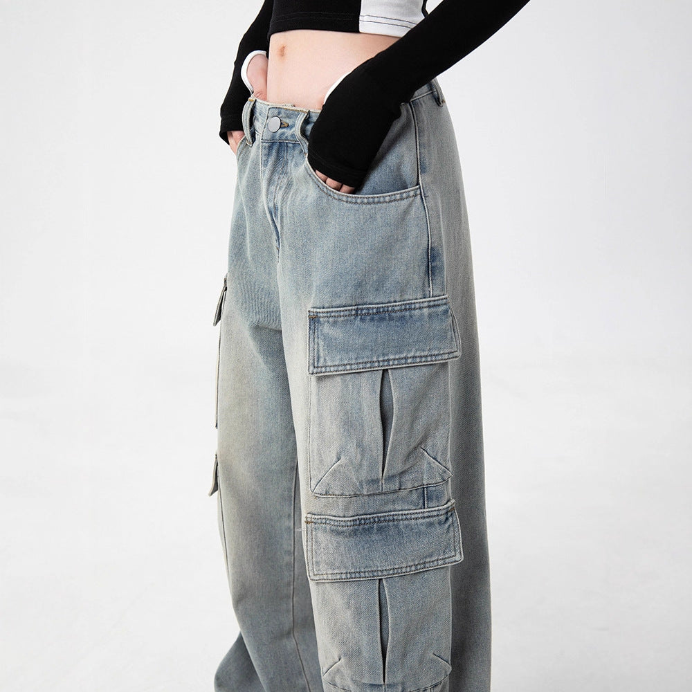 Women's workwear style distressed washed denim jeans