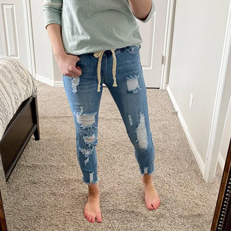 Elastic waist ripped hole small leg jeans for women