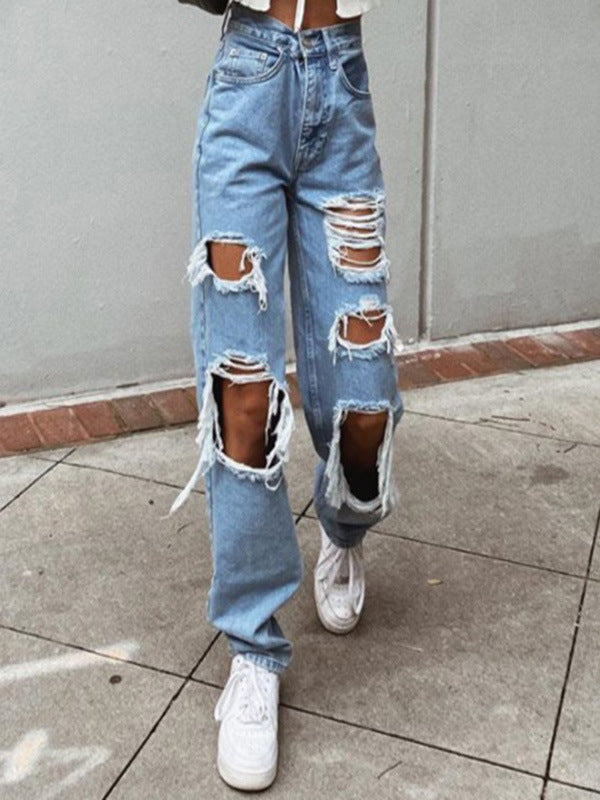 Thin jeans with wide legs and holes for women