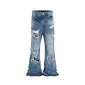 Vintage washed distressed micro flared jeans with holes