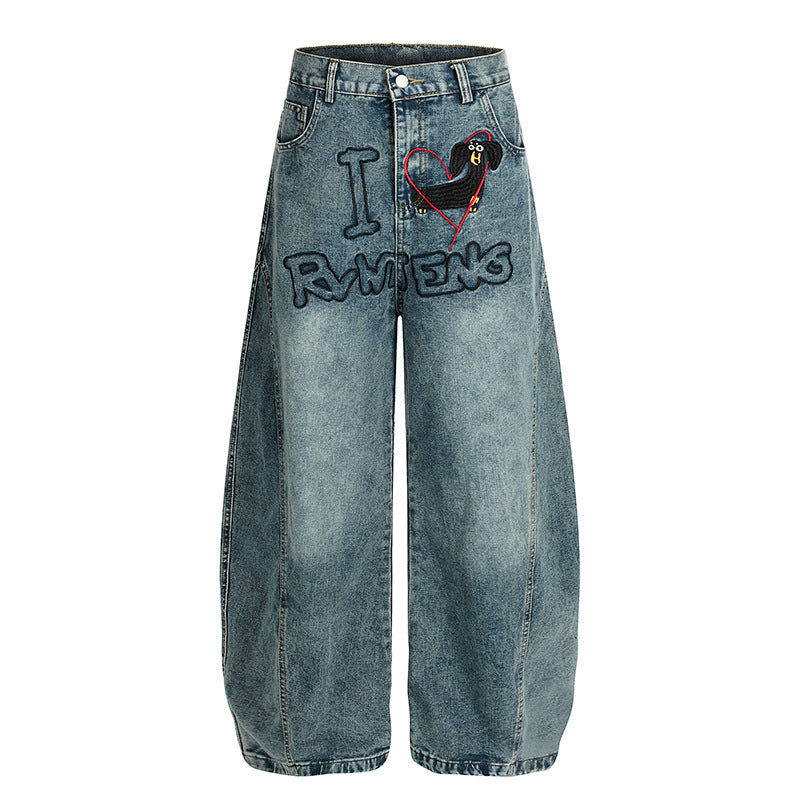 Embroidered wide leg curved knife jeans