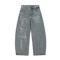 Graffiti printed curved knife jeans